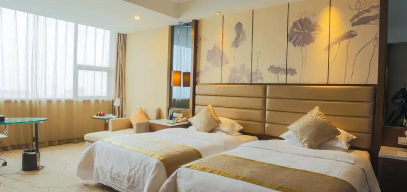 Imagen de la habitación del Hotel JINLING INTERNATIONAL HOTEL. Foto 12