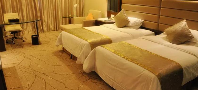 Imagen de la habitación del Hotel JINLING INTERNATIONAL HOTEL. Foto 13