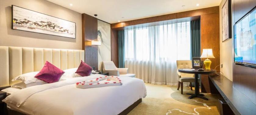 Imagen de la habitación del Hotel JINSHANHUI BOUTIQUE HOTEL. Foto 9
