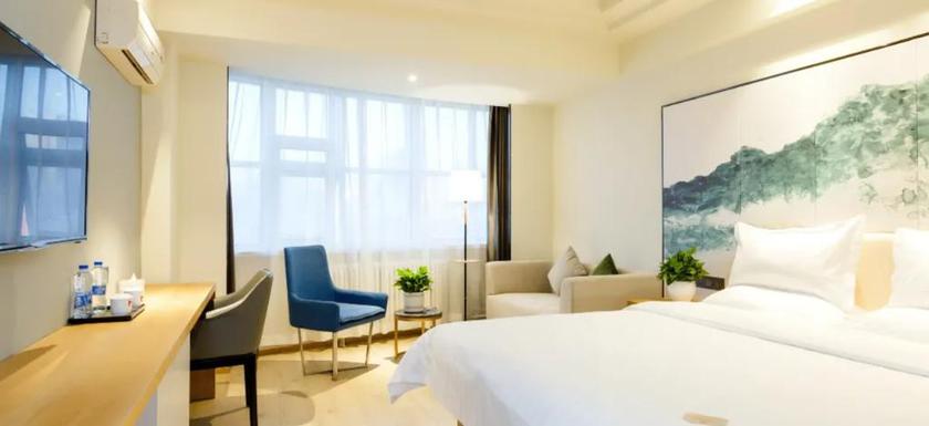 Imagen de los interiores del Hotel JINYI YOUXUAN HOTEL (XINHUAXI ST. FUYUAN. Foto 14