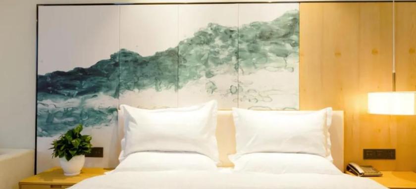 Imagen de la habitación del Hotel JINYI YOUXUAN HOTEL (XINHUAXI ST. FUYUAN. Foto 3