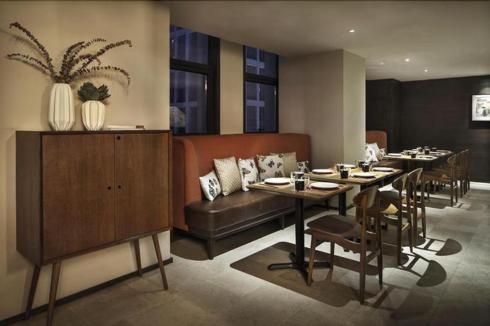 Imagen del bar/restaurante del Hotel JINYUE HENGMEI BOUTIQUE HOTEL. Foto 1