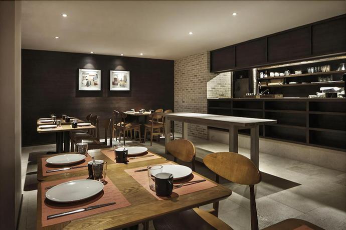 Imagen del bar/restaurante del Hotel JINYUE HENGMEI BOUTIQUE HOTEL. Foto 2