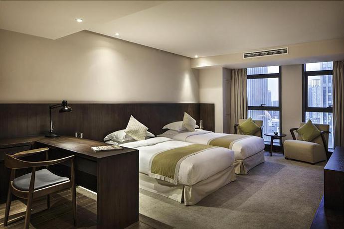 Imagen de la habitación del Hotel JINYUE HENGMEI BOUTIQUE HOTEL. Foto 6