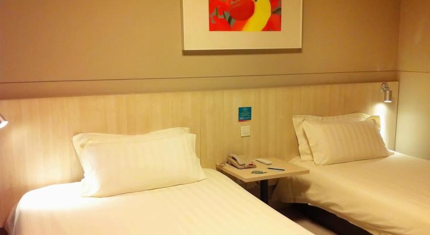 Imagen de la habitación del Hotel JJ Inns - Shanghai Hongkou Football Stadium. Foto 3