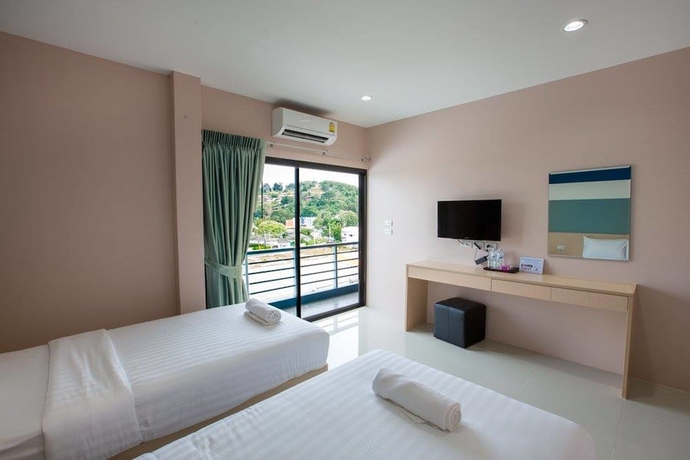 Imagen de la habitación del Hotel JJ Residence Phuket Town. Foto 10