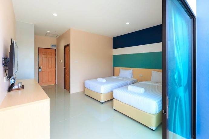 Imagen de la habitación del Hotel JJ Residence Phuket Town. Foto 11