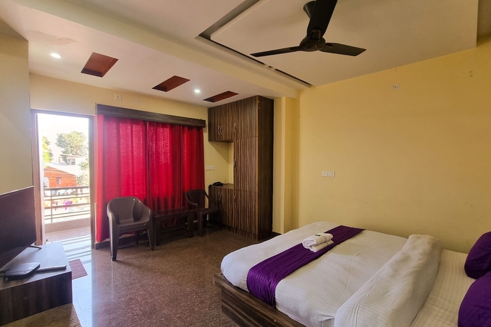 Imagen de la habitación del Hotel JK Dharamshala. Foto 5