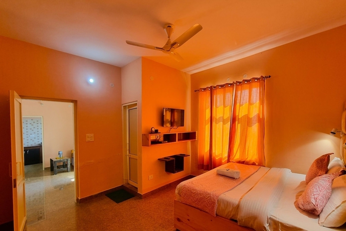 Imagen de la habitación del Hotel JK Dharamshala. Foto 7
