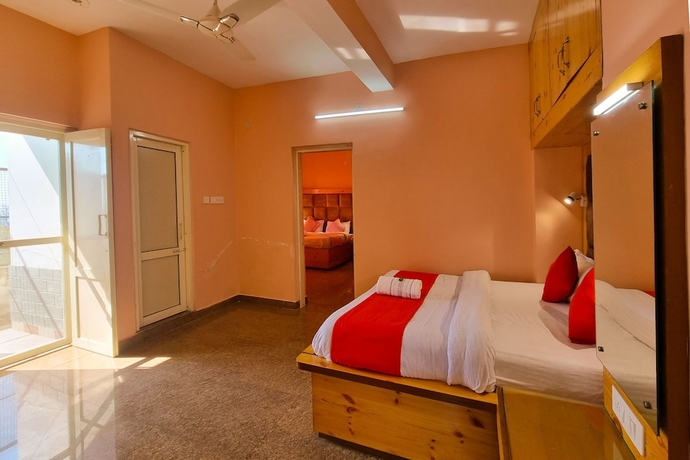 Imagen de la habitación del Hotel JK Dharamshala. Foto 11