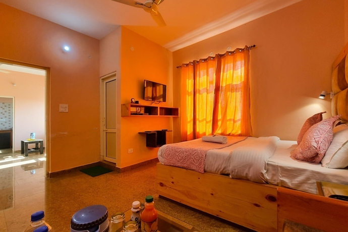 Imagen de la habitación del Hotel JK Dharamshala. Foto 13