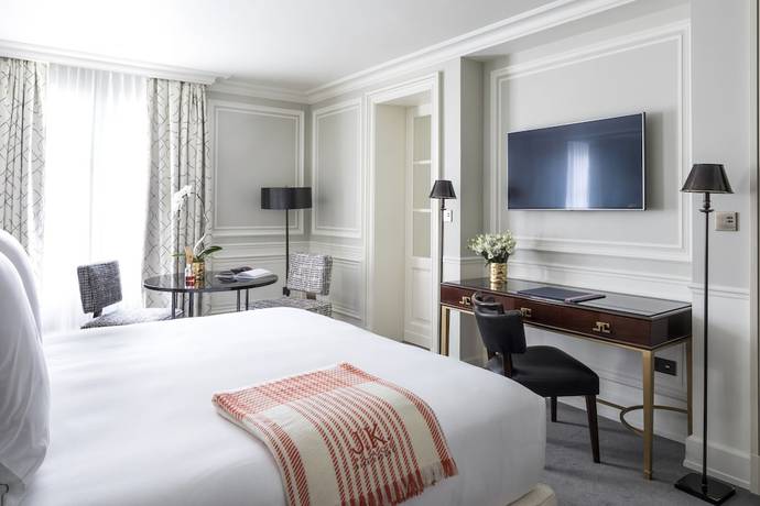 Imagen de la habitación del Hotel J.K. Place Paris. Foto 9