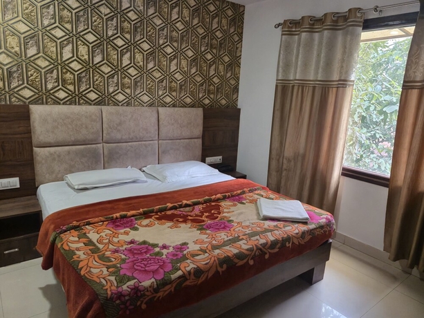 Imagen de la habitación del Hotel JK Residency, Amritsar. Foto 4