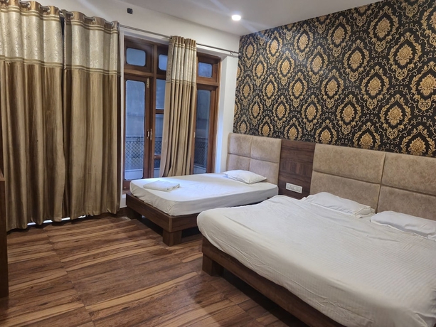 Imagen de la habitación del Hotel JK Residency, Amritsar. Foto 7