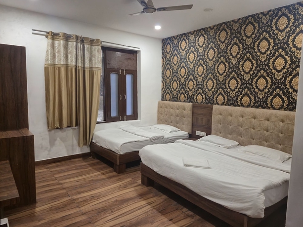 Imagen de la habitación del Hotel JK Residency, Amritsar. Foto 10