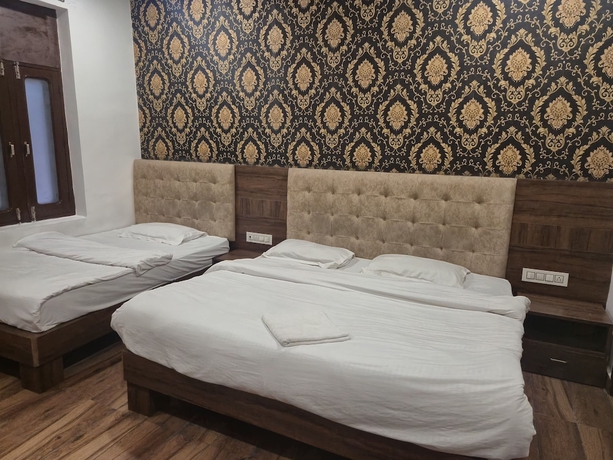 Imagen de la habitación del Hotel JK Residency, Amritsar. Foto 11