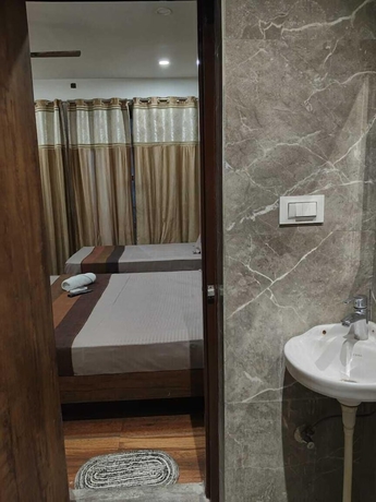 Imagen de la habitación del Hotel JK Residency, Amritsar. Foto 12