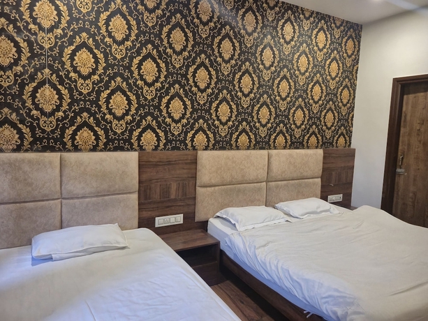 Imagen de la habitación del Hotel JK Residency, Amritsar. Foto 13
