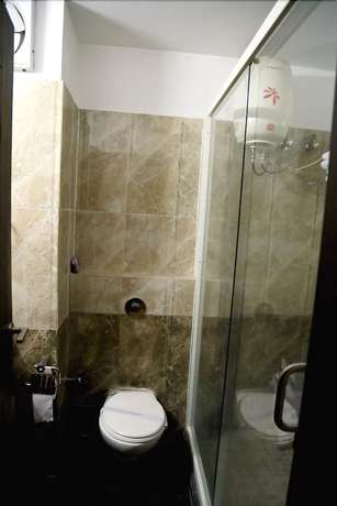 Imagen de la habitación del Hotel JK Rooms 130 Paras. Foto 13