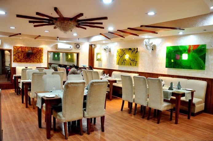Imagen del bar/restaurante del Hotel JK Rooms 130 Paras. Foto 11