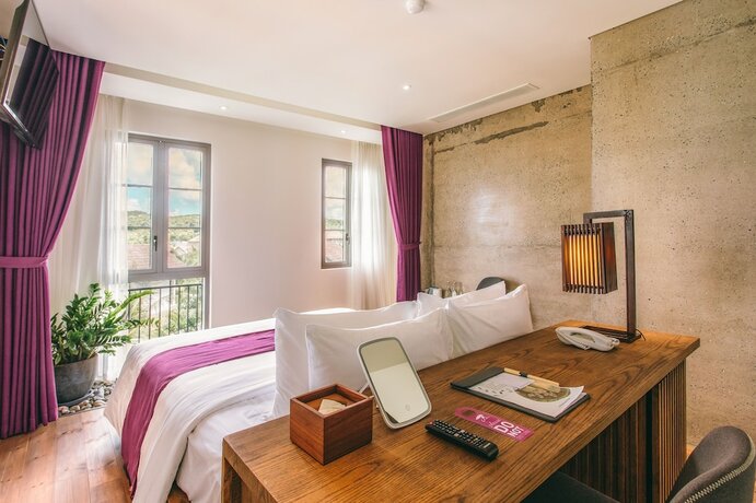 Imagen de la habitación del Hotel JM Boutique. Foto 18