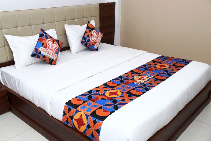 Imagen de la habitación del Hotel JMC HOTEL KIA INN. Foto 11