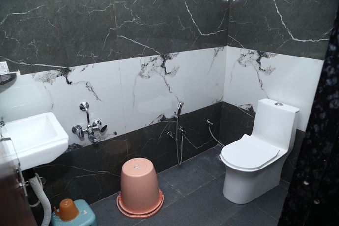 Imagen de la habitación del Hotel JMC HOTEL KIA INN. Foto 13