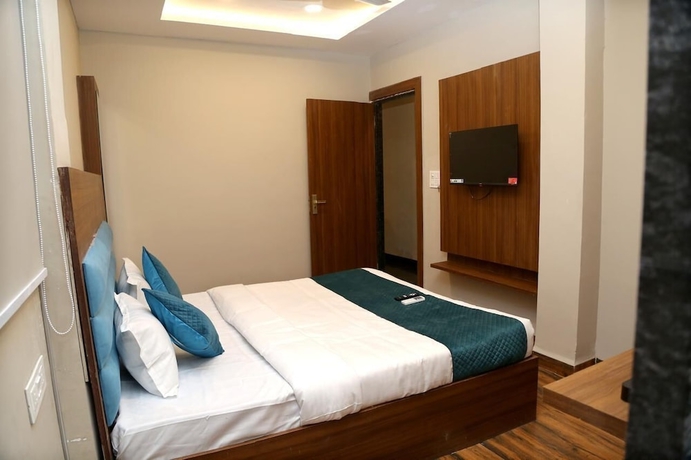 Imagen de la habitación del Hotel JMC Safar Inn Mhow. Foto 12