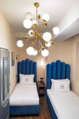 Imagen de la habitación del Hotel JN Boutique. Foto 14