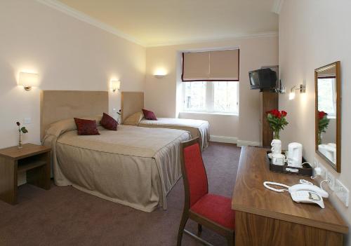 Imagen de la habitación del Hotel JOIVY Haymarket. Foto 9