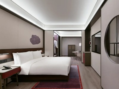 Imagen de la habitación del Hotel JOYA Shanghai Gubei. Foto 2