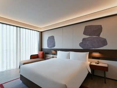 Imagen de la habitación del Hotel JOYA Shanghai Gubei. Foto 3