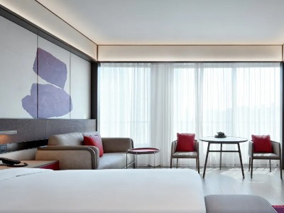 Imagen de la habitación del Hotel JOYA Shanghai Gubei. Foto 8