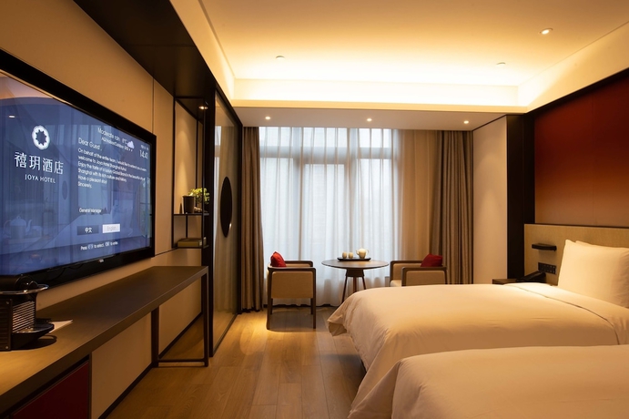 Imagen de la habitación del Hotel JOYA Shanghai Xujiahui Hotel. Foto 5