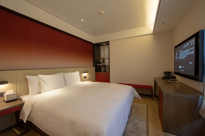 Imagen de la habitación del Hotel JOYA Shanghai Xujiahui Hotel. Foto 9