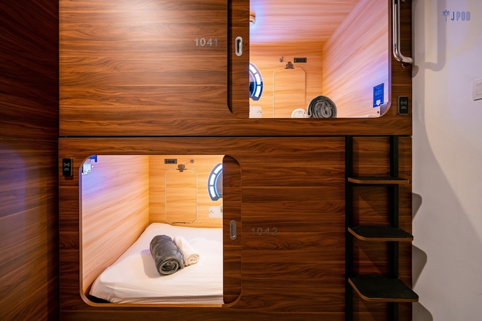 Imagen de la habitación del Hotel JPOD Capsule. Foto 8