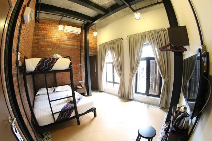 Imagen de la habitación del Hotel JQ Ban Loong Boutique. Foto 5