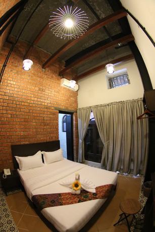 Imagen de la habitación del Hotel JQ Ban Loong Boutique. Foto 7