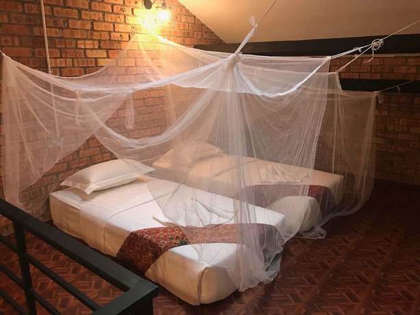 Imagen de la habitación del Hotel JQ Ban Loong Boutique. Foto 8