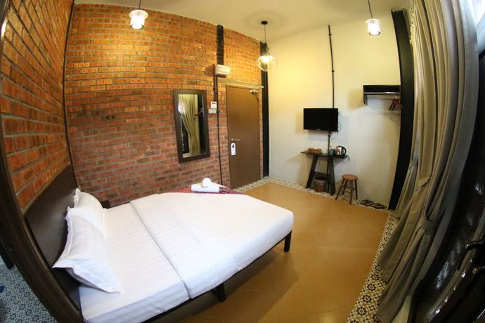 Imagen de la habitación del Hotel JQ Ban Loong Boutique. Foto 14
