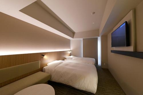 Imagen de la habitación del Hotel JR Inn Sapporo-eki Minami-guchi. Foto 6