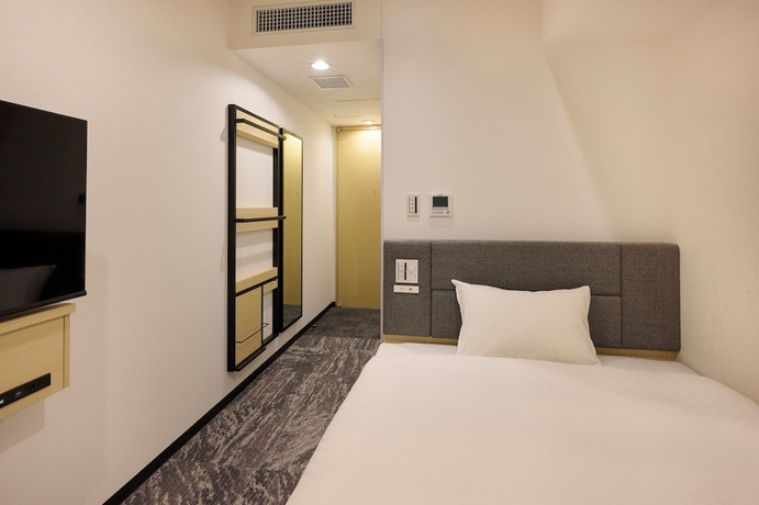 Imagen de la habitación del Hotel JR WEST GROUP VIA INN PRIME KUMAMOTO. Foto 13