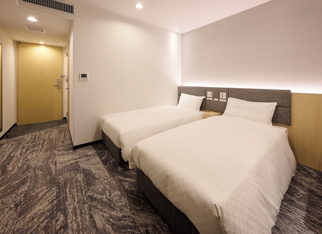 Imagen de la habitación del Hotel JR WEST GROUP VIA INN PRIME KUMAMOTO. Foto 15