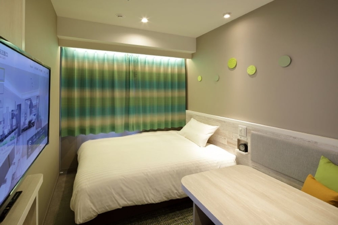Imagen de la habitación del Hotel JR WEST GROUP VIA INN SHINOSAKA SHOMENGUCHI. Foto 5