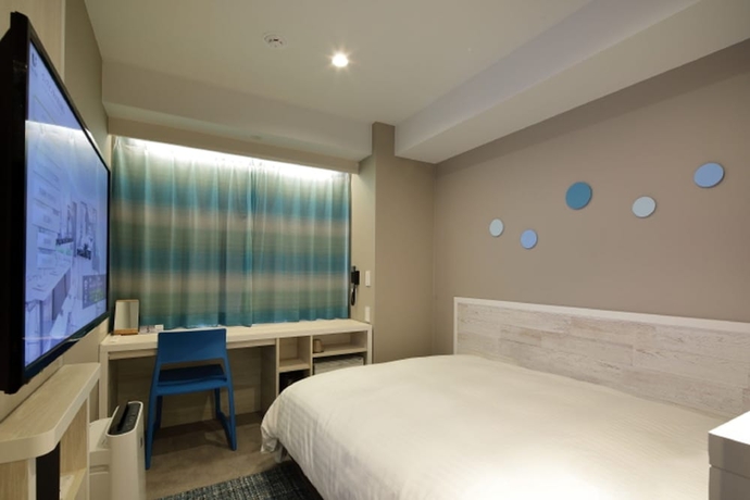 Imagen de la habitación del Hotel JR WEST GROUP VIA INN SHINOSAKA SHOMENGUCHI. Foto 9