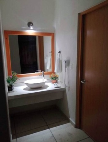 Imagen de la habitación del Hotel JS. Foto 8