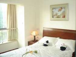 Imagen de la habitación del Hotel JUNLING INTERNATIONAL. Foto 2