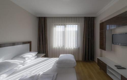 Imagen de la habitación del Hotel JURA HOTELS ALTINOLUK THERMAL, Edremit. Foto 20