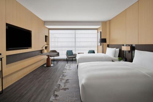 Imagen de la habitación del Hotel JW Marriott Taiyuan. Foto 16
