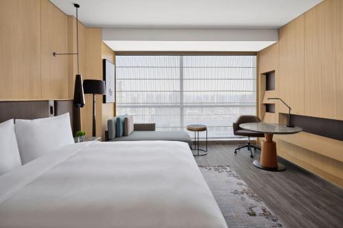 Imagen de la habitación del Hotel JW Marriott Taiyuan. Foto 17